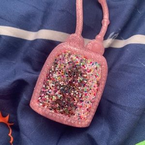 Hand sanitizer holder